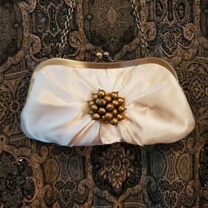 Elegant Vintage Cream Clutch with Gold Accent